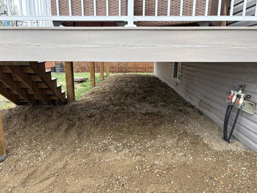 Clean graded gravel installed under a deck in Moose Jaw Saskatchewan